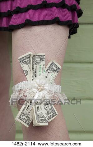 Low section view of a woman tied paper currencies with a garter, Creek Street, Ketchikan, Alaska, USA View Large Photo Image Picture - Low section view of a woman tied paper currencies with a garter, Creek Street, Ketchikan, Alaska, USA. Fotosearch