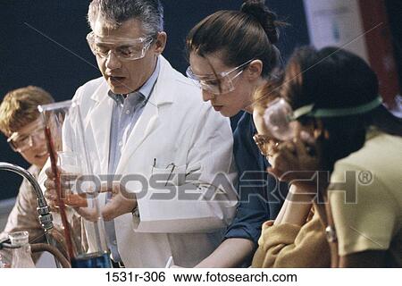 Male professor with students in a lab View Large Photo Image Stock Photograph - Male professor with students in a lab. Fotosearch