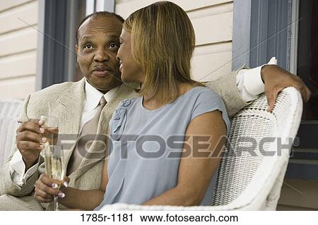 Mature African American couple celebrating with champagne View Large Photo Image Stock Image - Mature African American couple celebrating with champagne. Fotosearch