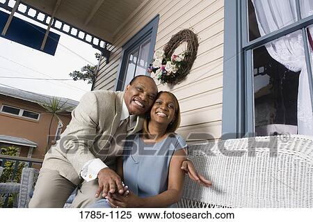 Mature couple hugging and smiling View Large Photo Image Stock Photography - Mature couple hugging and smiling. Fotosearch