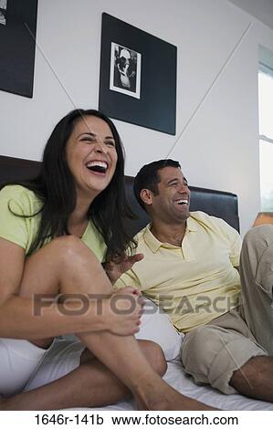 Mature couple smiling in the bed View Large Photo Image Stock Image - Mature couple smiling in the bed. Fotosearch
