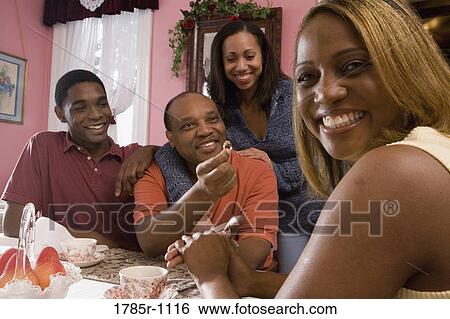 Mature man proposing to woman while adult children watch View Large Photo Image Stock Photograph - Mature man proposing to woman while adult children watch. Fotosearch