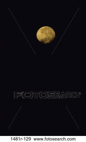 Stock Photo - Moon glowing at night. Fotosearch