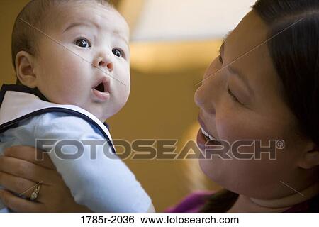 Mother and baby boy View Large Photo Image Stock Photograph - Mother and baby boy. Fotosearch