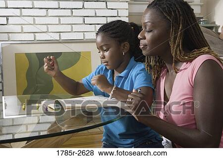 Mother and daughter coloring View Large Photo Image Stock Photo - Mother and daughter coloring. Fotosearch