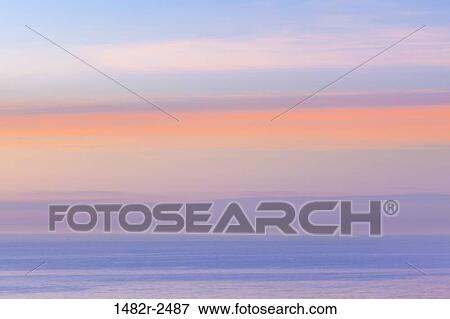 Stock Photo - Ocean at sunset, California, USA. Fotosearch