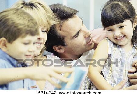 Parents with their children View Large Photo Image Stock Image - Parents with their children. Fotosearch