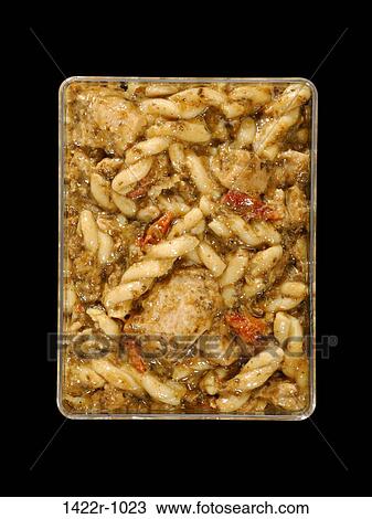 Plastic tray with cheese pasta in a pesto sauce View Large Photo Image Stock Image - Plastic tray with cheese pasta in a pesto sauce. Fotosearch