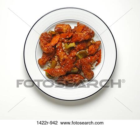 Stock Image - Plate of Chinese styled chicken and rice. Fotosearch