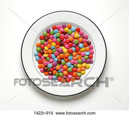 Stock Photography - Plate with colour candy pieces. Fotosearch
