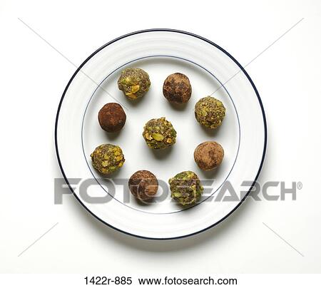 Plate with nine assorted chocolate truffles View Large Photo Image Stock Photography - Plate with nine assorted chocolate truffles. Fotosearch