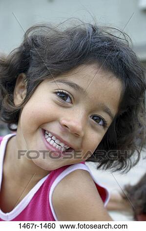 Portrait of a girl smiling View Large Photo Image Stock Image - Portrait of a girl smiling. Fotosearch