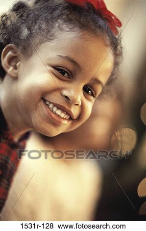 Portrait of a girl smiling View Large Photo Image Stock Photo - Portrait of a girl smiling. Fotosearch
