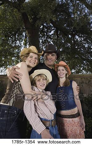 Picture - Portrait of a happy country family. Fotosearch