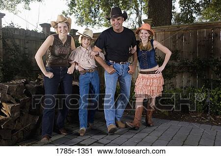 Portrait of a happy country family View Large Photo Image Stock Image - Portrait of a happy country family. Fotosearch