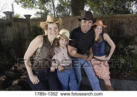Portrait of a happy country family View Large Photo Image Stock Image - Portrait of a happy country family. Fotosearch