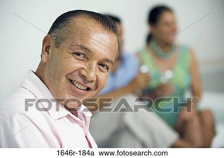 Portrait of a mature man smiling View Large Photo Image Stock Image - Portrait of a mature man smiling. Fotosearch