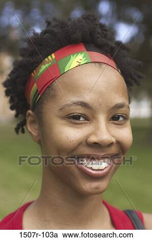 Portrait of a teenage girl smiling View Large Photo Image Stock Image - Portrait of a teenage girl smiling. Fotosearch