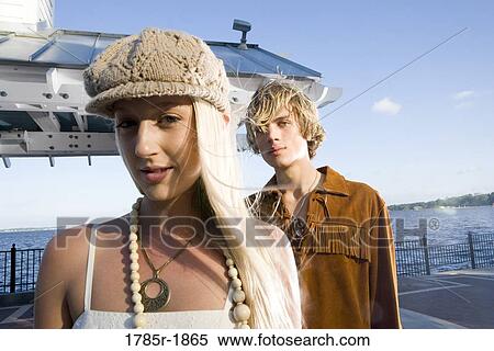 Portrait of a young couple in vintage 1960's hippie costumes View Large Photo Image Stock Photography - Portrait of a young couple in vintage 1960's hippie costumes. Fotosearch