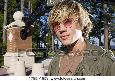 Portrait of a young man in vintage 1960's hippie costume View Large Photo Image Stock Image - Portrait of a young man in vintage 1960's hippie costume. Fotosearch