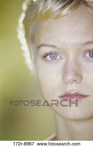 Stock Photo - Portrait of a young woman. Fotosearch