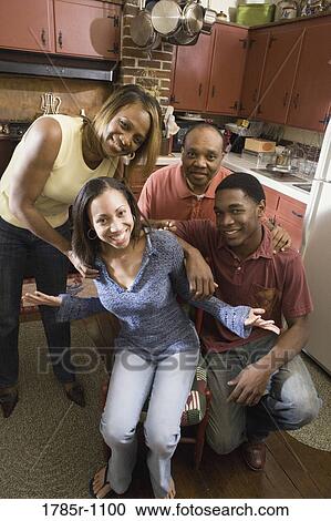 Portrait of African American family in kitchen View Large Photo Image Stock Image - Portrait of African American family in kitchen. Fotosearch