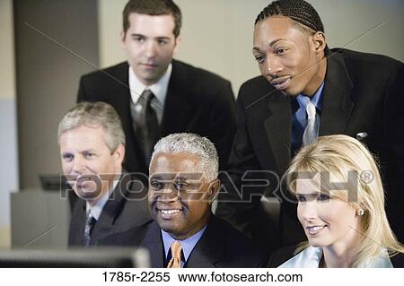 Portrait of business colleagues working in an office View Large Photo Image Stock Photography - Portrait of business colleagues working in an office. Fotosearch