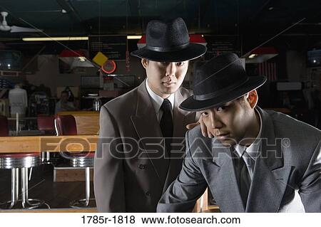 Portrait of two men in suits and hats View Large Photo Image Stock Photo - Portrait of two men in suits and hats. Fotosearch