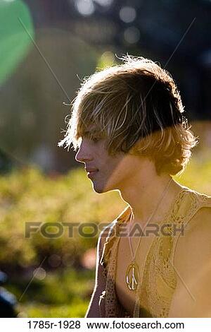 Profile of young hippie View Large Photo Image Stock Photo - Profile of young hippie. Fotosearch