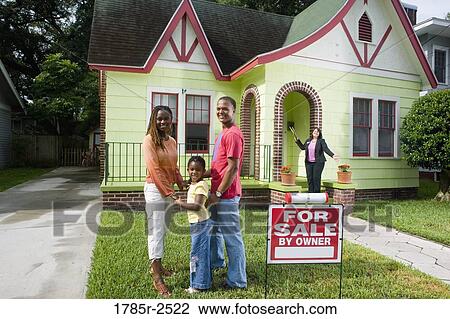 Real estate broker showing house to buyers View Large Photo Image Stock Image - Real estate broker showing house to buyers. Fotosearch