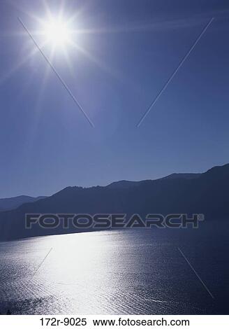 Reflection of the sun on Lake Pend Oreille, Idaho, USA View Large Photo Image Stock Photography - Reflection of the sun on Lake Pend Oreille, Idaho, USA. Fotosearch