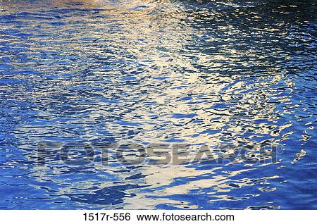 Ripples on the surface of water View Large Photo Image Stock Photograph - Ripples on the surface of water. Fotosearch