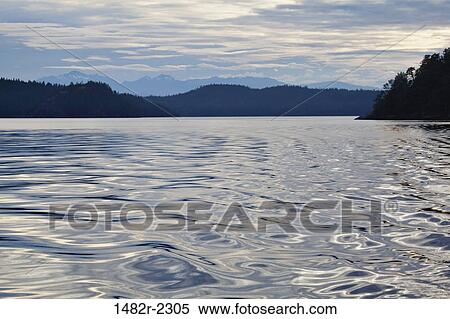 River with a mountain range in the background, Desolation Sound Marine Provincial Park, British Columbia, Canada View Large Photo Image Stock Photography - River with a mountain range in the background, Desolation Sound Marine Provincial Park, British Columbia, Canada. Fotosearch