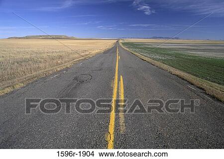 Picture - Road passing through a landscape, Ryan Dam Road, Great Falls, Cascade County, Montana, USA. Fotosearch