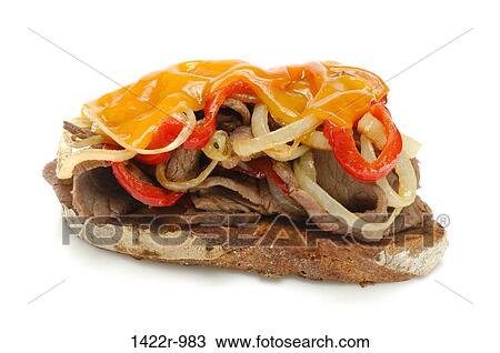 Stock Image - Roast beef sandwich with peppers, onions and melted cheddar cheese. Fotosearch
