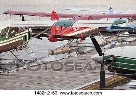 Seaplanes at dock, Ketchikan, Alaska, USA View Large Photo Image Stock Image - Seaplanes at dock, Ketchikan, Alaska, USA. Fotosearch