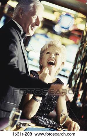 Stock Photo - Senior couple laughing. Fotosearch