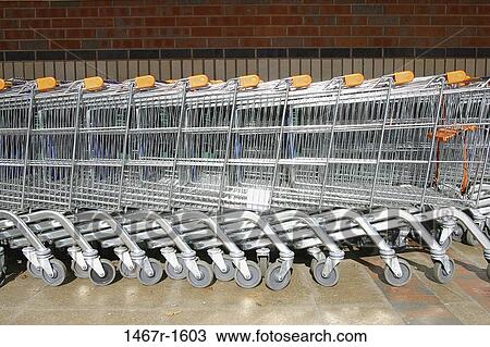 Shopping carts in a row View Large Photo Image Stock Image - Shopping carts in a row. Fotosearch