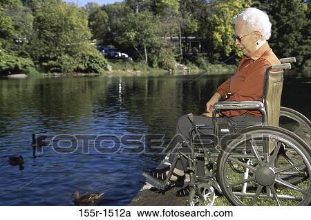 Side profile of a senior woman in a wheelchair View Large Photo Image Stock Image - Side profile of a senior woman in a wheelchair. Fotosearch