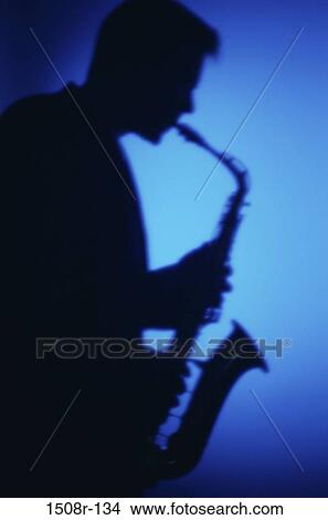 Silhouette of a man playing the saxophone View Large Photo Image Picture - Silhouette of a man playing the saxophone. Fotosearch