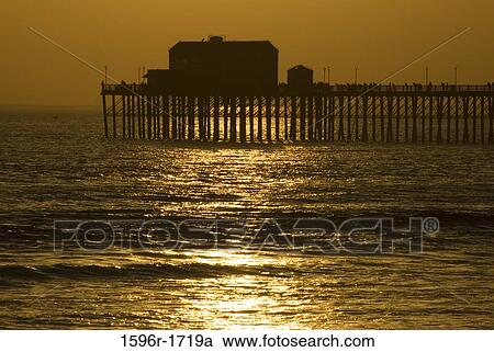 Silhouette of a pier at dusk, Oceanside, California, USA View Large Photo Image Stock Image - Silhouette of a pier at dusk, Oceanside, California, USA. Fotosearch