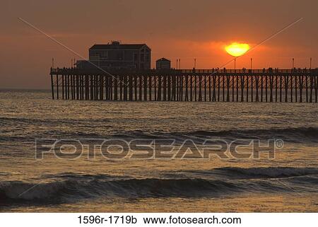 Silhouette of a pier at dusk, Oceanside, California, USA View Large Photo Image Stock Image - Silhouette of a pier at dusk, Oceanside, California, USA. Fotosearch