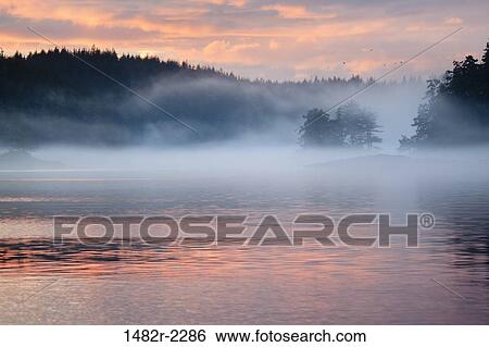 Strait with islands in the background, Broughton Island, Village Island, British Columbia, Canada View Large Photo Image Stock Photograph - Strait with islands in the background, Broughton Island, Village Island, British Columbia, Canada. Fotosearch
