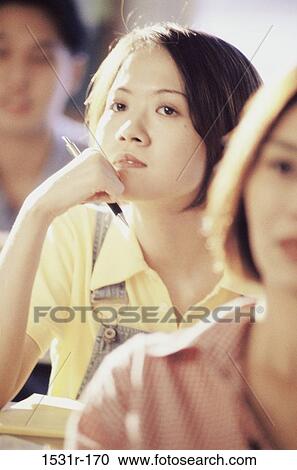 Students attending a class View Large Photo Image Stock Image - Students attending a class. Fotosearch