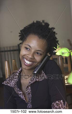 Teenage girl talking on a mobile phone View Large Photo Image Stock Image - Teenage girl talking on a mobile phone. Fotosearch