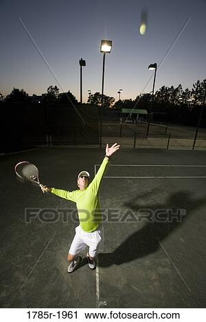 Tennis player serving View Large Photo Image Stock Image - Tennis player serving. Fotosearch