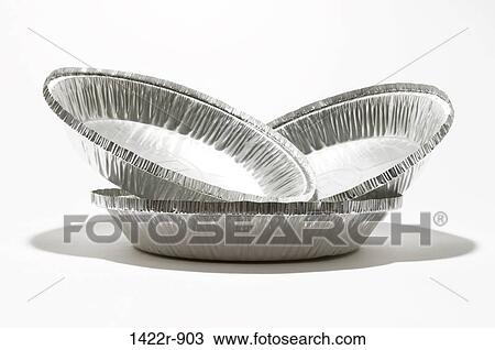 Stock Image - Three stacked aluminum metal containers. Fotosearch