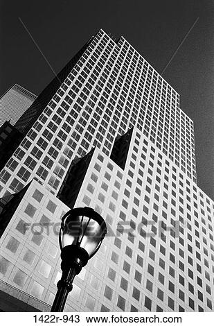 USA, New York, New York City, Glass office building with street lamp View Large Photo Image Stock Image - USA, New York, New York City, Glass office building with street lamp. Fotosearch