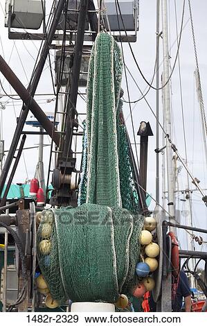 Stock Photo - USA, Oregon, Charleston, Fishing net on boat. Fotosearch