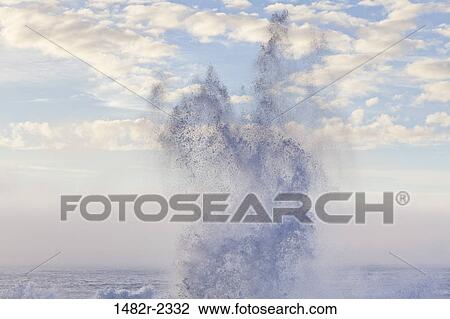 Stock Image - USA, Oregon, Shore Acres State Park, Ocean waves splashing. Fotosearch